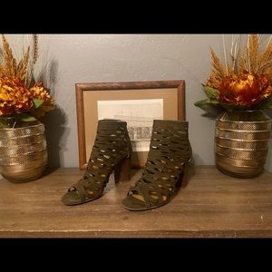 COMFORTABLE and stylish olive green heels with zipper in back. Worn maybe 2x.